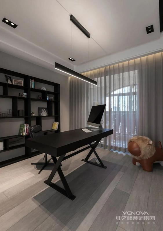 书房整体布置格局简洁,开放式书架可以收纳大量的书籍和摆件.