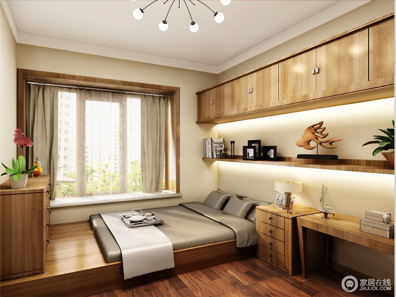 卧室整体以木结构来打造空间的整体性与实用性，榻榻米兼具双重功效，是设计的独特之处；实木玄关柜增强了收纳作用，与装饰摆件呈现着雅致。