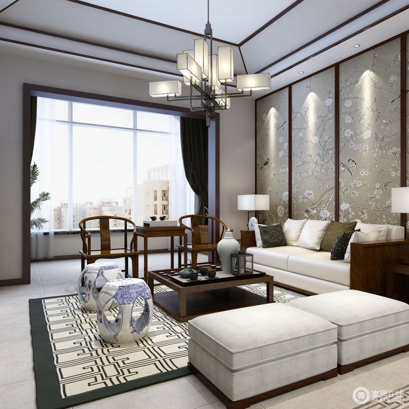 客厅用色极为简单，三幅中式风景画便成为沙发背景墙，渐渐将抽象的“东方概念”带入空间。