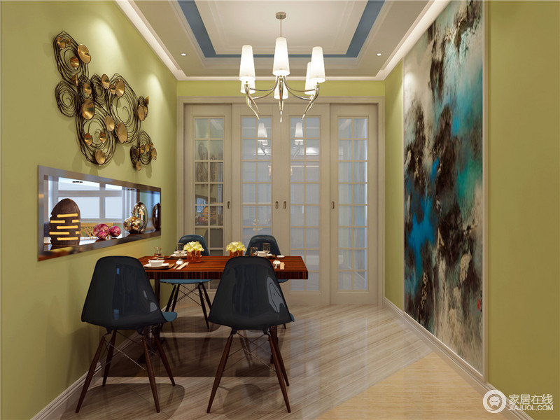 把墙面刷成黄绿色，泼墨般洒脱的装饰画，让整个空间呈现出艺术范。而用餐区的正上方，墙面上抽象的工艺装饰则让整个空间看起来更具动感。
