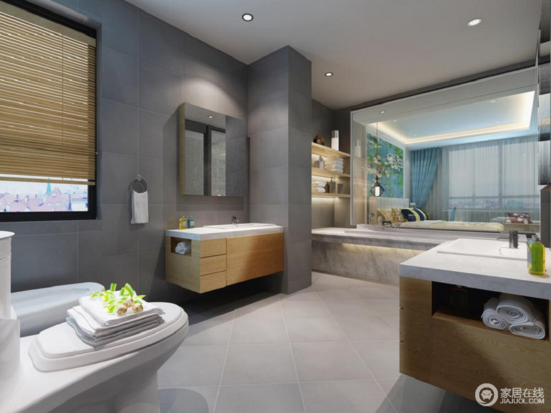 卧室的卫生间使用低调的灰色大理石，带着沉稳冷静的气质，对称的双盥洗台方便主人同时使用，浴缸上方使用搁板收纳，透明的玻璃则增加空间的情趣性。