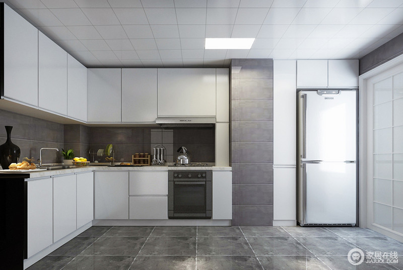 利用仿古砖打造出现代感的厨房，为了避免过于沉灰，将橱柜选为白色，一改厨房的面貌。