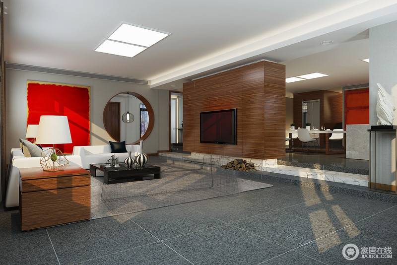 开放式客厅利用圆与方塑造出方圆有序的空间，灰色地砖增加了空间的硬朗；精简的饰品起到画龙点睛的效果，令空间愈加和谐。