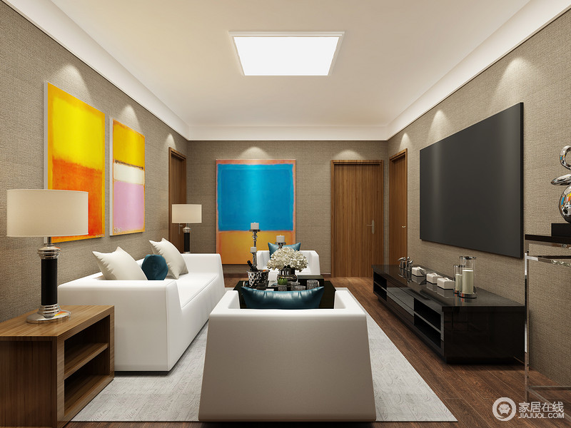 空间色调简单，利用挂画及家具来营造色块的局面，让色块拼接出家的层次与基调。