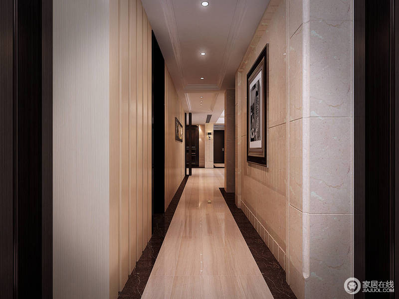 走廊设计的十分简单，只通过线条来丰富墙面，不同的挂画带着不同的内涵来表达艺术；黑色砖石作为勾边，与木纹地砖形成一体，简单中突出层次，令整个明暗有序，节奏感强烈。
