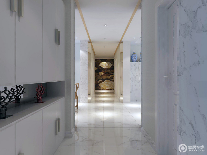 灰白的砖石透着清新和明朗，而走廊中设计师利用白色收纳柜增强了空间的功能性，让水墨的视感延伸致整个空间，丝毫不减少中式的意蕴。