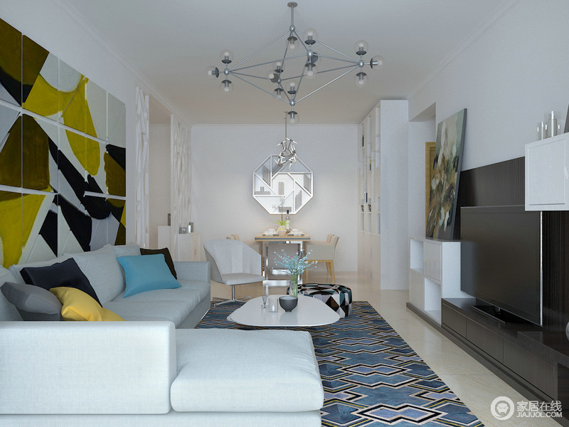空间以白色调为主，通过不同的艺术品渲染出温情而质感的生活格调；客厅以拼接式版画表达抽象艺术，并以明快的色彩与蓝色几何地毯碰撞出时尚，白色沙发与黑白组合的电视柜以简约与实用并举，让生活更为惬意。