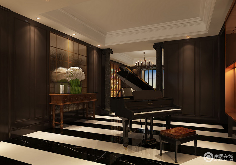 空间整体设计虽然较为简单，但是设计师利用墙面造型和照明设计调节出一个沉稳凝练的空间；原木边柜上的花卉坐落在钢琴一侧，让空间沉寂而优雅。