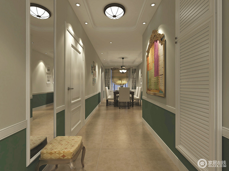 从门厅走廊一眼望到餐厅深处，使视觉上形成一种深邃感。灰绿拼接的墙面，略带复古风情又丰富了墙面的层次。穿衣镜安装在门厅，方便出入整理仪容，同时拉伸过道空间的视觉。