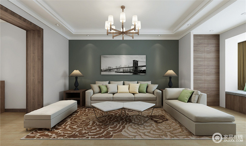 深灰蓝的墙面背景配灰白系列沙发，在明度较低的色彩渲染下，空间看上去祥和、安宁。拼接的双茶几自然过渡到花纹繁复的双拼色地毯上，迎来客厅里的绚烂焦点。