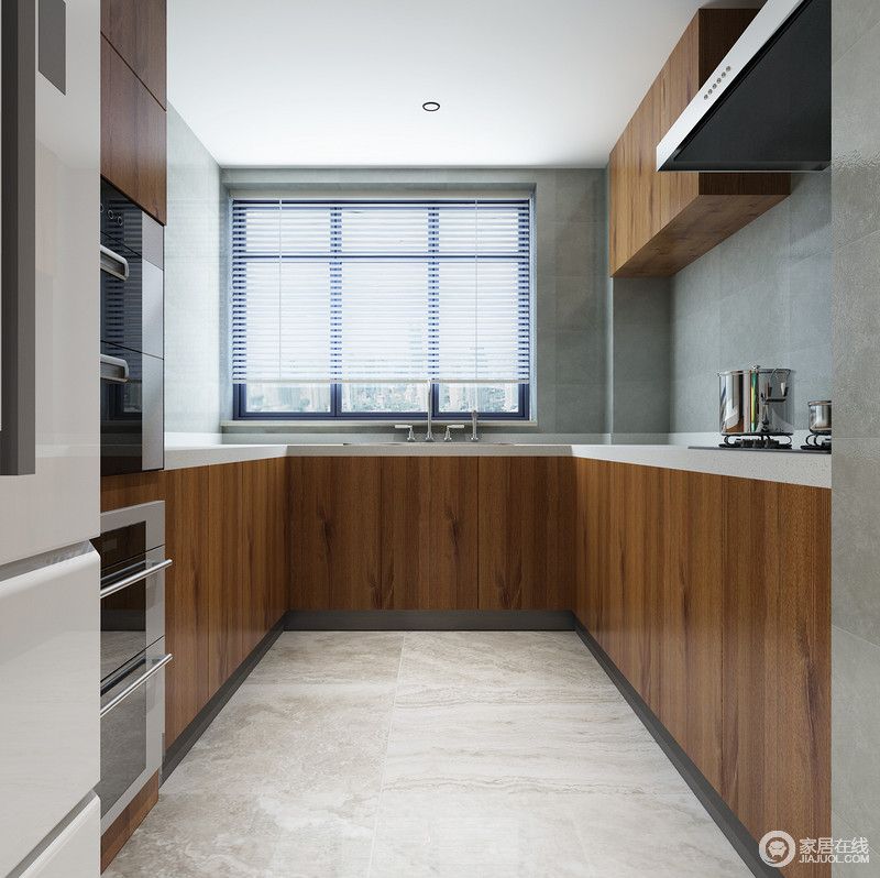 厨房的线条十分简单，并利用灰色地砖和实木橱柜搭配出一个简单而温和氛围；为了增加空间的整洁性，将电器嵌入柜体，无形之中，尽显现代质感。