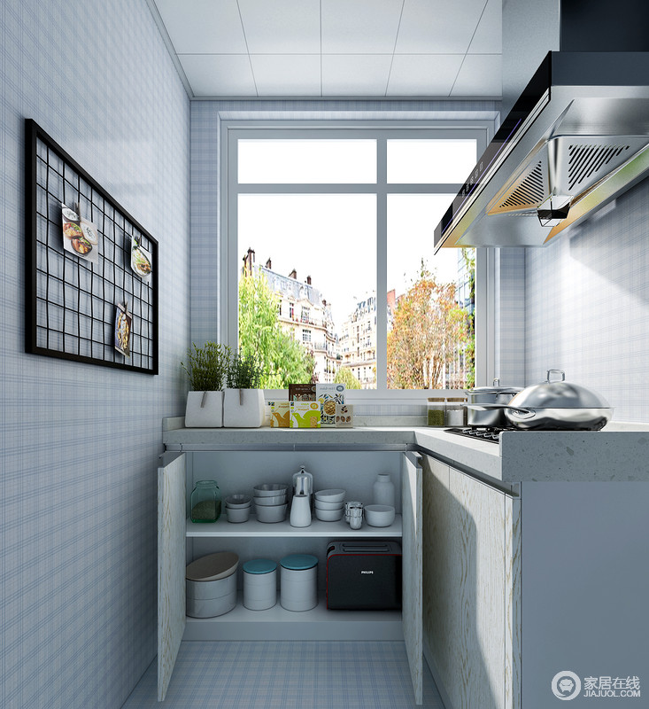 厨房白色的吊顶与蓝白小方格的地砖搭配，让整个厨房都清新了不少；虽然空间面积不大，但是L型橱柜足以满足生活之用。