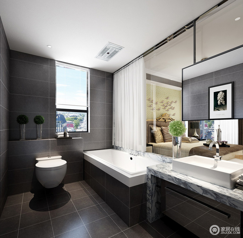 浴室中地面与墙面统一采用黑色，铺贴出黑色时尚，白色的浴缸和盥洗台简单大气，现代卫浴质感被表现到极致。