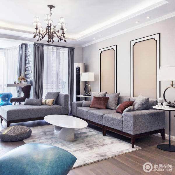 沙发背景墙运用简单的线条装饰，丰富客厅的层次和立体感。