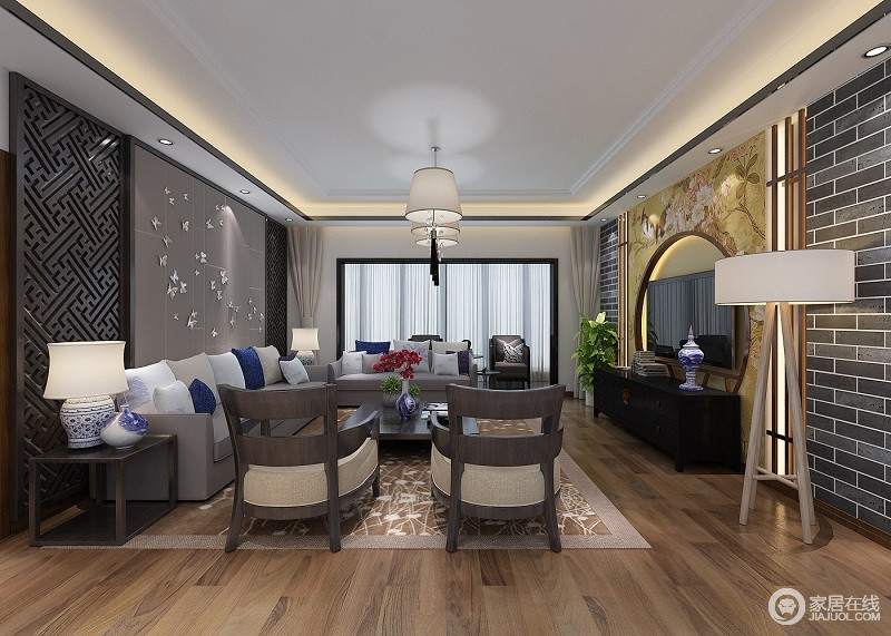 客厅以简洁大方的灰色为主色调，富有中国韵味的电视背景墙在沙发和原色地板的辉映下，充满了生的活力。