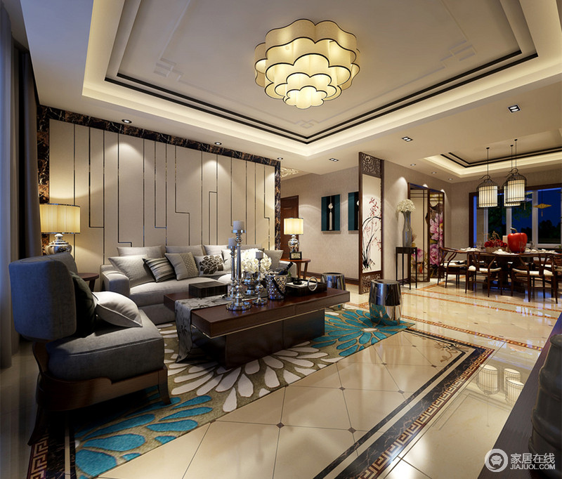 客厅兼具了中式的儒雅和现代的舒朗，沙发墙、地板及地面上的线条图案，彰显出几何的魅力演绎；布艺实木沙发棕灰色搭配，柔软舒适中带着温润沉和。