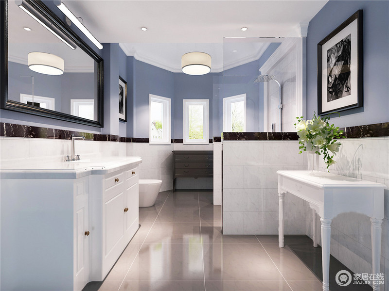卫浴间极富时尚气息，虽然以简单为主，但是蓝与白拼接而成的立面，化解了单色的平铺直叙，以色彩来营造动感；艺术画空间中恰如其分的点缀更富艺术格调。