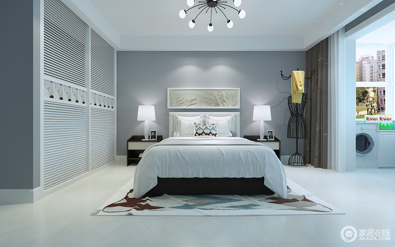 卧室以灰色和白色来勾勒了一个沉雅的视觉效果，静默中更显现代；所以在选择上选择了黑白双色，巧妙的与灰色进行过渡，展现了休息空间的宁静感，再加上家具设计上的简约，更显品质。