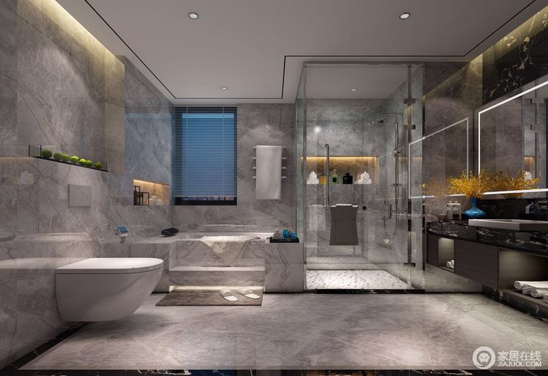 卫浴空间以有着细腻纹理的灰色大理石，采用点光源的方式演绎，使空间避免暗沉。各个功能区布置的较为紧凑，空出充足的活动区域，盥洗台角落的花束，点缀出几分明媚。