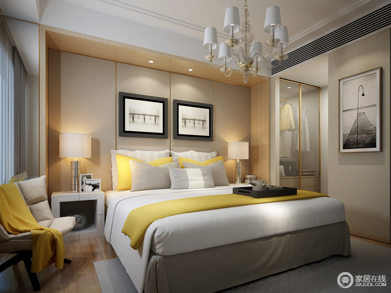 卧室背景墙内凹造型，营造一种包裹式的安全感。黄白交叠的床品演绎视觉上的清新明媚，制作轻松入睡憩韵。里侧墙体内置的衣柜，以玻璃门装饰，方便日常选择衣物。