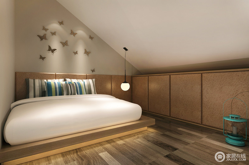 阁楼经过改建，变为卧室，纯木色空间一扫阁楼的阴暗，白色床品带来洁净和清爽，在蝴蝶装饰中确保了空间自然舒适度。