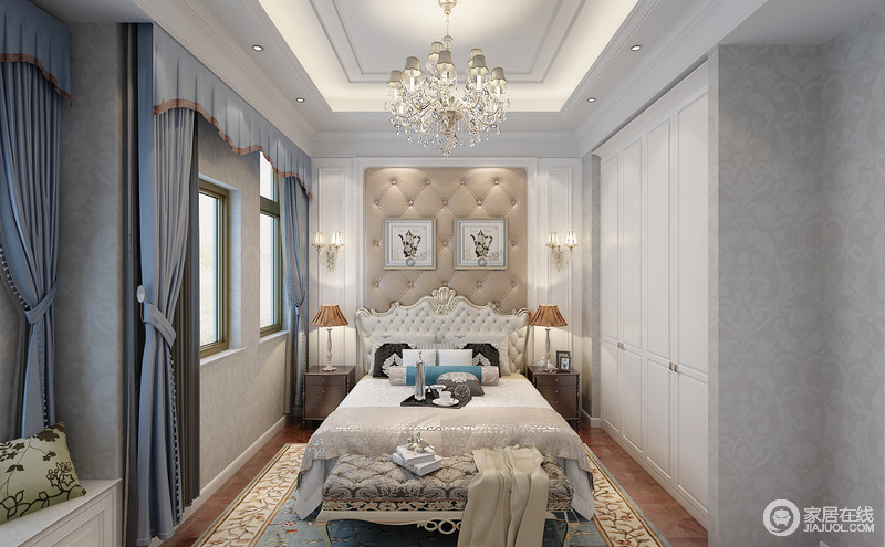 卧室将纯净的白色与蓝色搭配，丰富的印花以壁纸及布艺的点缀烘托空间上的华美情韵。欧式双人床上的雕花细腻精致，与软包上的拉扣，盈动出典雅的味道。