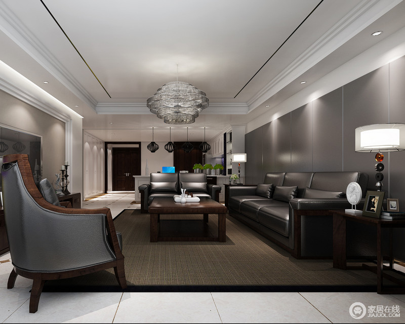 客厅的设计独有自身的特色，黑咖色、水晶盘形吊灯、藤条地毯和简洁的家具饰品，使暗色的氛围变得并不沉闷，反而给人一种舒适安静。