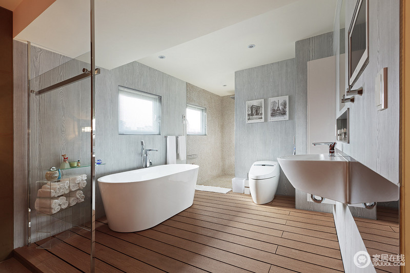 材质选用上以木纹水泥板与石材为牆面设计，让原始的自然风味在卫浴场域裡发酵。