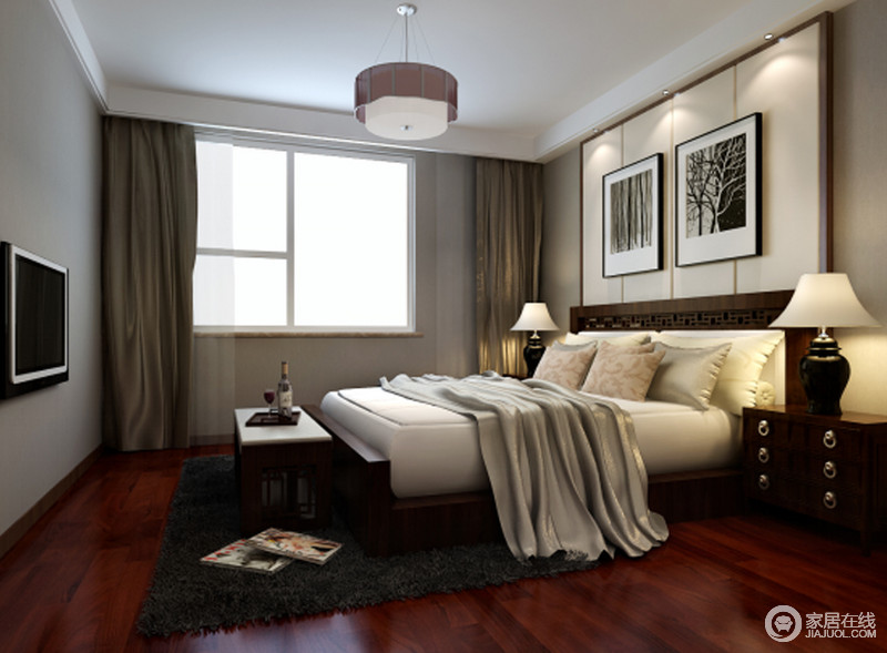 卧室镂空雕花打造的床头，让中式风格更加突显。背景墙上的软包隔板与客厅背景墙相呼应，形成空间上的统一。整个居室以温良的气质布满整个角落，也表现出主人温雅的品性。