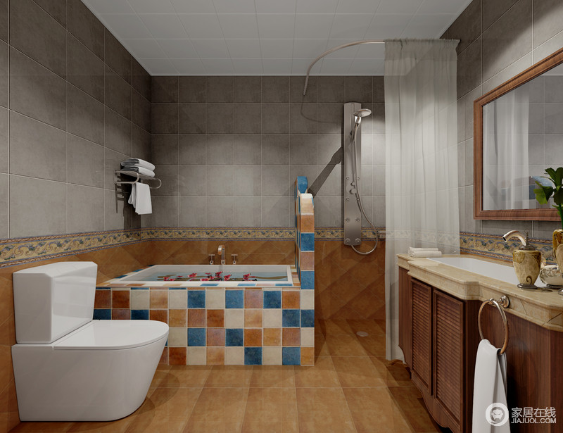 卫生间以花纹墙腰作为分隔线，以灰青拼接怀旧暖黄砖墙，丰富了空间的层次性。而马赛克砖铺就的浴缸则显得分外鲜明。淋浴区以防水纱帘做以干湿分区，质朴空间不失独特格调。