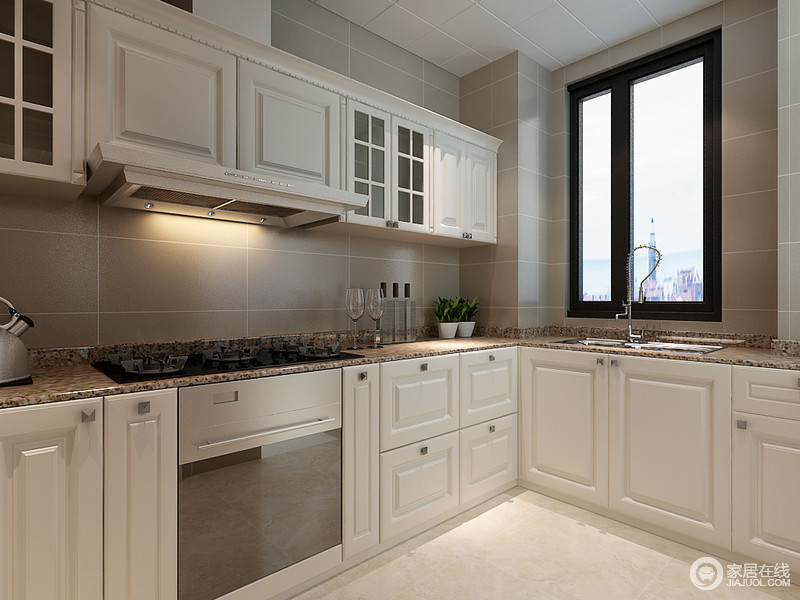 厨房利用白色定制橱柜来化解灰色立面的沉闷，起伏有度的立面展现出几何的美感；大理石台面恰当的融合，不仅增加了硬朗感，更便于打理。