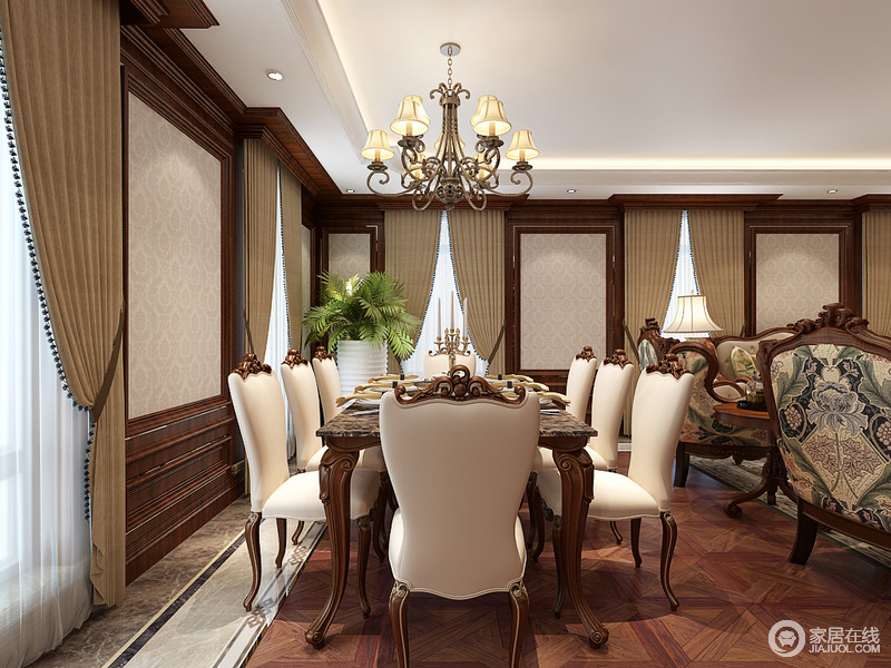 餐厅与客厅同处一室，材质上形成呼应。餐椅上的米白色与墙面护墙板内嵌的印花壁纸相得益彰，雕花与描金的修饰，使空间很好的展现出欧式的典雅之美。