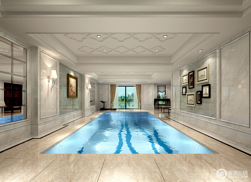 游泳室通体采用大理石打造，湛蓝的水面成为空间中最为清爽的设计；墙面挂画区不仅文艺范儿十足，还将马赛克艺术表现得淋漓尽致，拓新展旧，视感绝佳。