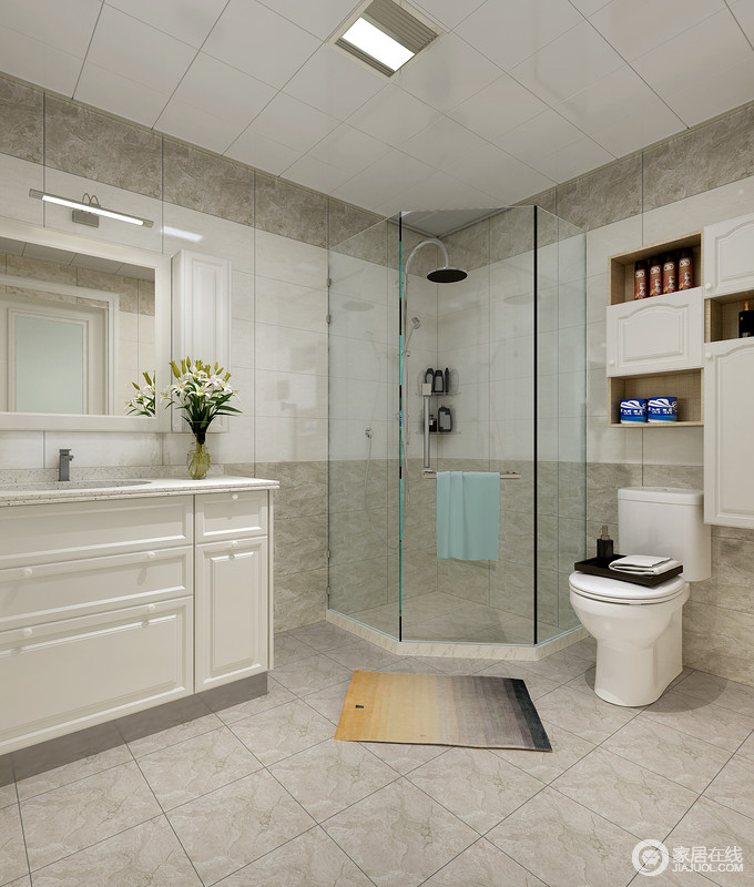 卫生间以灰色暗纹砖石和白色瓷砖搭配的方式，让立面的几何与地面的朴素构成空间的素静；角落的空间被设计呈淋浴室，解决了干湿分区和空间的缺陷，同时搭配白色盥洗柜、收纳柜，让沐浴生活更有条理和质感。