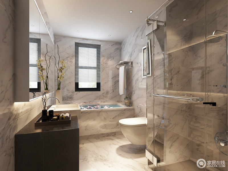 灰色石纹材质的瓷砖以整体化一的形式铺贴出一个现代、质朴、大气的卫浴空间；玻璃区恰到好处地将功能性进行区分，给人无限的精致。