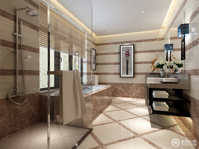 横条纹与斜条纹的相互搭配，带来卫浴空间的丰富视觉。在大空间里分别设置了浴缸与淋浴，满足主人的多种沐浴需求。简洁的陈列，带来空间上的简洁整齐感。