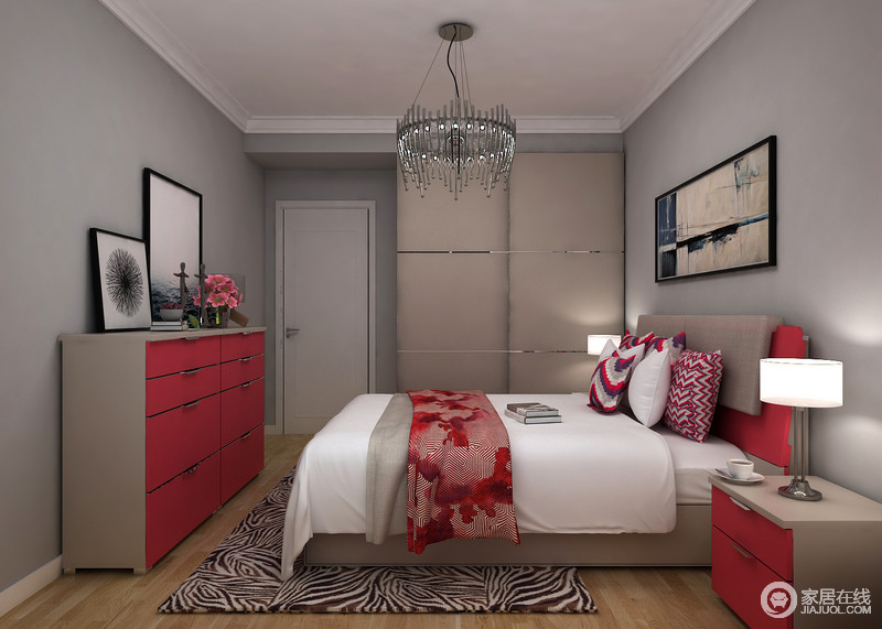 卧室被涂刷了灰色的涂料，只为营造一个朴素、冷静的空间，让主人能够再此沉静下来；驼色衣柜和驼色、红色组合的家具成套摆设在空间，既实用又给予空间生活该有的热度，再加上红色布艺饰品、挂画，都为主人带来生活的隽意和安适。