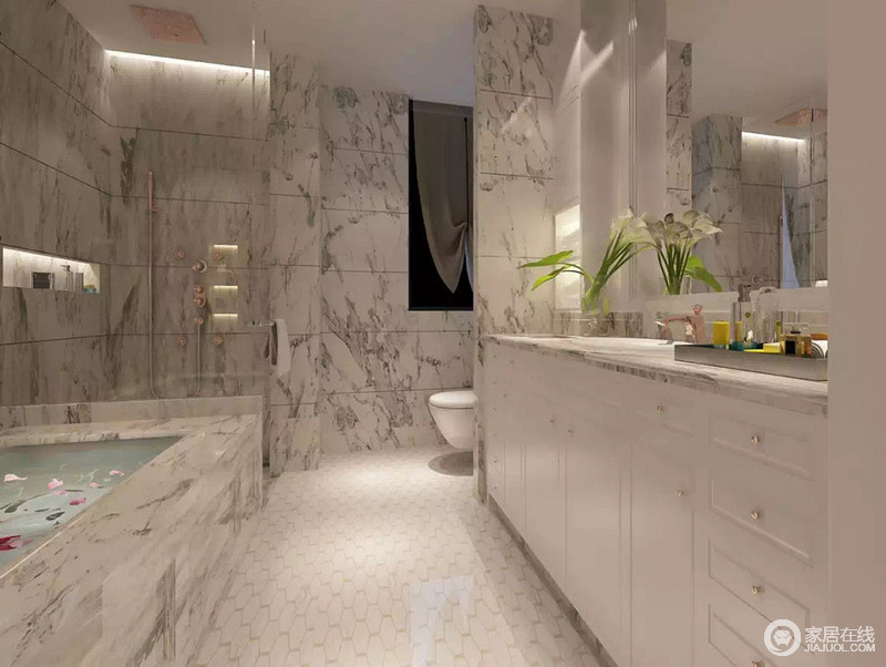卫浴间十分摩登，借用大理石天然形成的文脉来装扮空间，令白色盥洗台和五边形白色地面多了色彩的对比，层次中显出美感来。