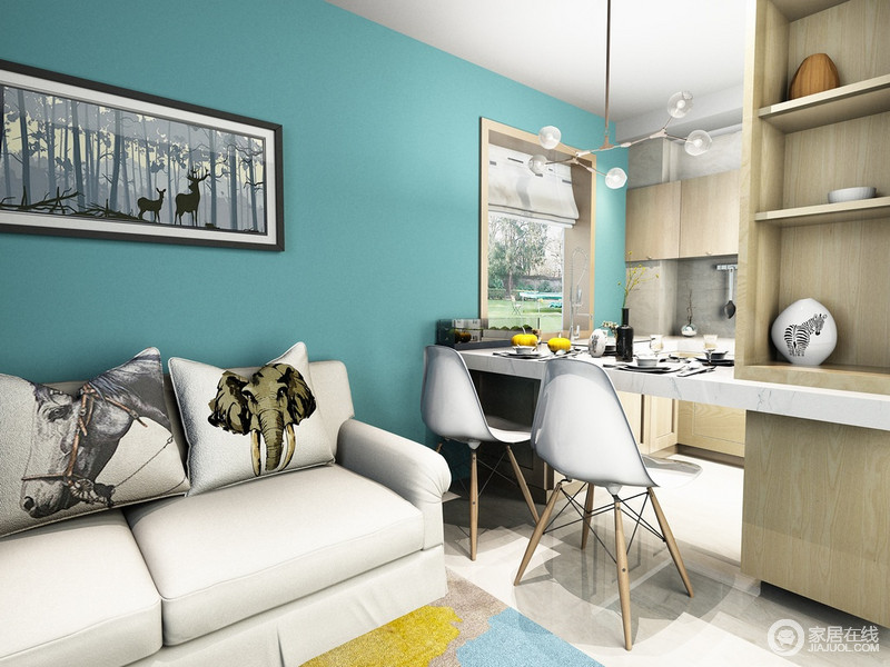 墙面粉刷了清灵的蓝色调，奠定了空间柔冷的基调，在保证空间的独立性和合理性的同时，将餐厅与客厅合二为一，力求打造极度便利；灰白色布艺沙发和北欧风的餐椅与餐厨区的互动性成为设计的亮点。
