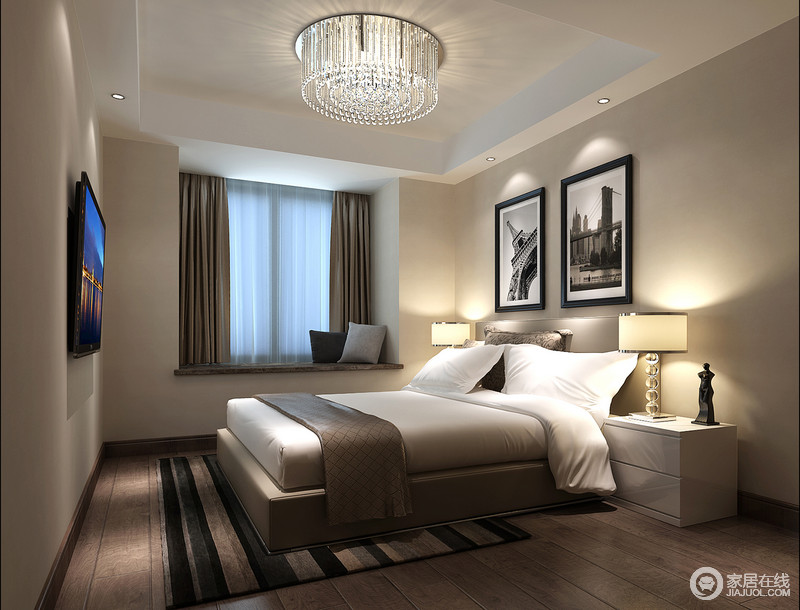 次卧的风格比较偏向现代，墙面以低调内敛的浅驼色铺陈，带动空间的气氛比较静谧温和。床品布艺上选用咖色混搭白色，辅以条纹地毯，在光影的辉映下展现出沉稳安宁感。