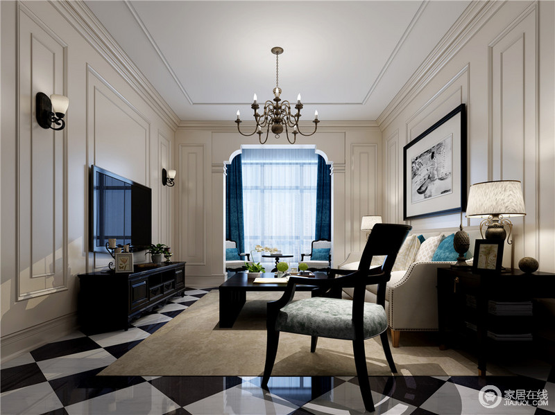 整个空间采用白色护墙板，渲染出纯净的空间气质。黑色家具填充其间，与地板上的黑白拼色形成呼应；靠包上的深蓝与窗帘色调一致，点缀出一抹深邃。