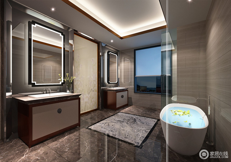 卫生间运用了对称造型设计，为空间带来格律之美。灰色的大理石墙在浴室镜内置的灯带光线下，带来视线山的静谧典雅。隔断墙与玻璃，有效划分了空间的功能区域。