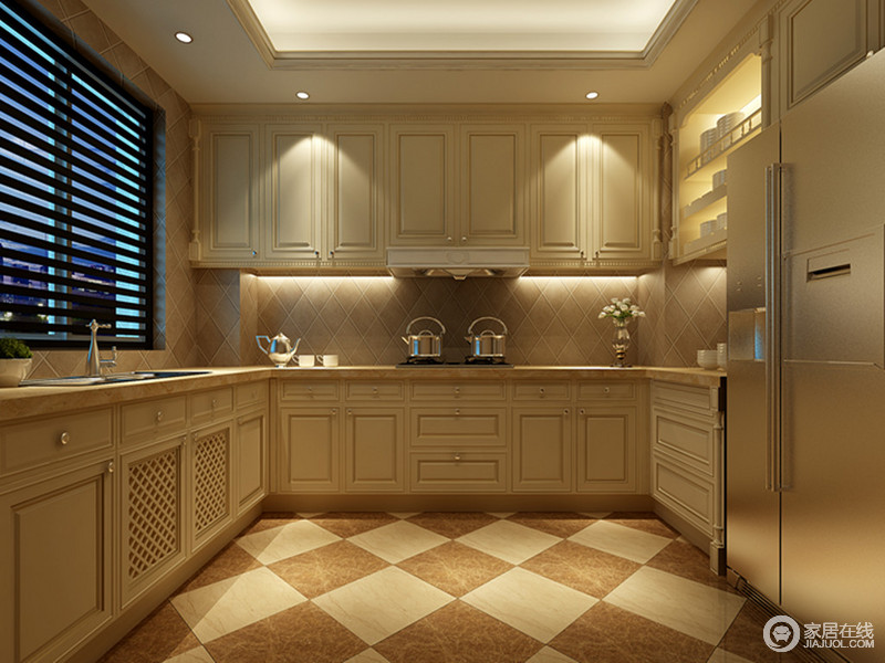 厨房中整体一色的橱柜让空间更显利落，菱形双色拼接的地板增加了空间的可变可视性。