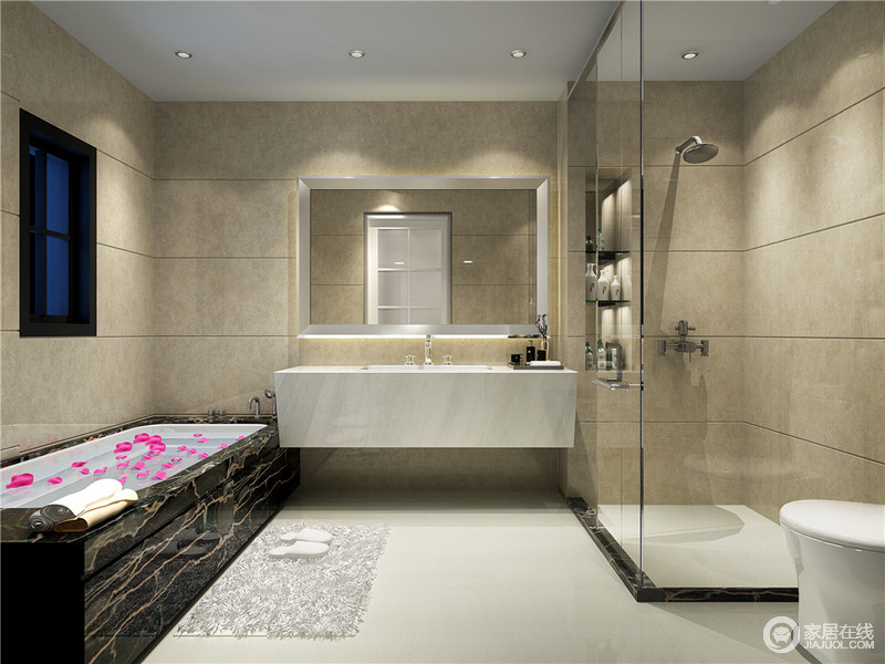 简约的卫浴空间里，墙面的色调朴质温和，洁具系列与浴缸则黑白搭配，突显简洁利落。玻璃材质隔离的淋浴间，墙内的壁龛收纳归拢了沐浴物品。