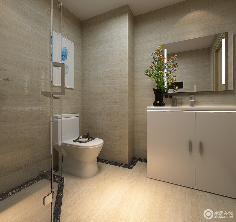 卫生间的布置极其的干脆利落，米黄大理石透着简洁质感。银灰色的盥洗橱柜与瓶插花束、画作则平衡了空间的单调，勾勒出空间的悠然活力。