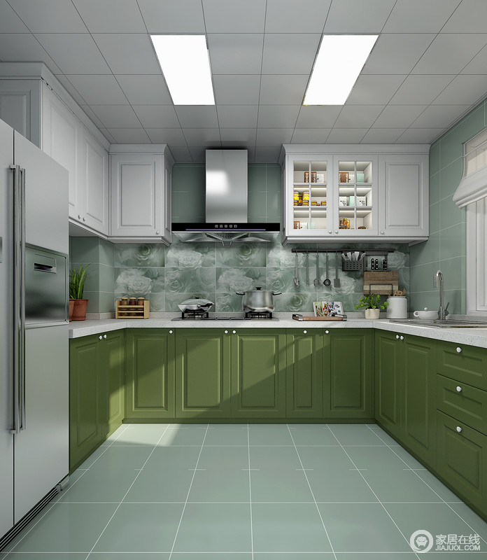 U字型橱柜的布局可以最大最合理的利用厨房空间，不仅整洁美观，其储物收纳也得到了增加。以绿色为基调，白色与浅灰点染其间，三分灰的知性冷静，伴随两分白的皎洁明净，使整个室内充满温情与典雅。
