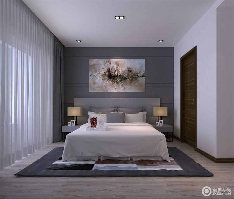 卧室主要运用灰色和白色为空间的舒适性服务，没有了色彩的夸张，只为营造一个静谧的氛围；抽象艺术画栩栩如生，与对称的两盏台灯形成现代之精，呈现出强烈的前卫感。