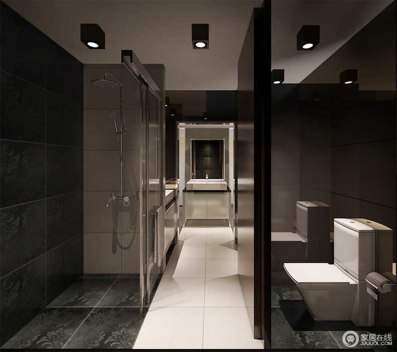 卫浴间以白色地砖为中轴线，将黑色暗花地砖铺贴的淋浴间及隐私区分布在两侧，尽头处的简约盥洗台摆脱了暗调，也为空间带来光明。