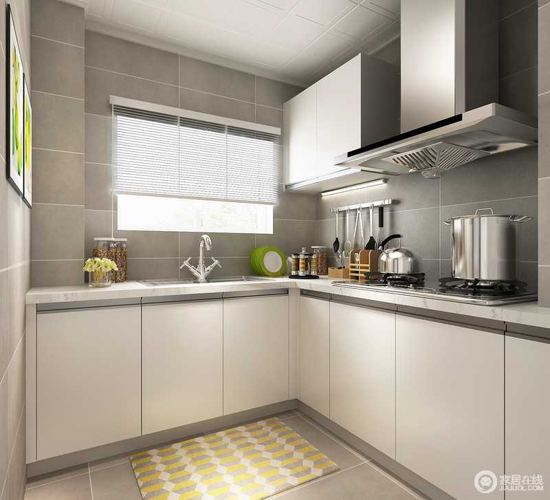 厨房采用灰色砖墙铺陈，白色壁橱相配，搭出都市精致质感。靠窗部分设计了小面积的置物柜，挂杆将厨具有效收纳，地板上黄绿条纹地毯渲染出一丝活力。