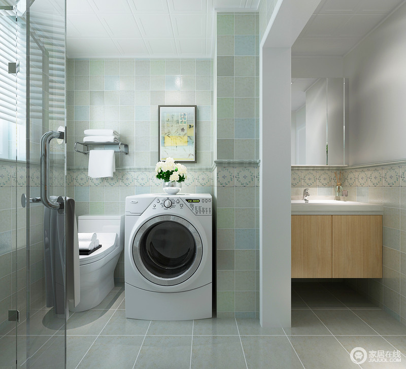 卫生间以马赛克、花砖有效铺贴出轻盈清新敞朗的空间，并通过垭口和玻璃形成功能分区。定制的盥洗台充分利用角落空间，淋浴房有效使空间干湿分离。